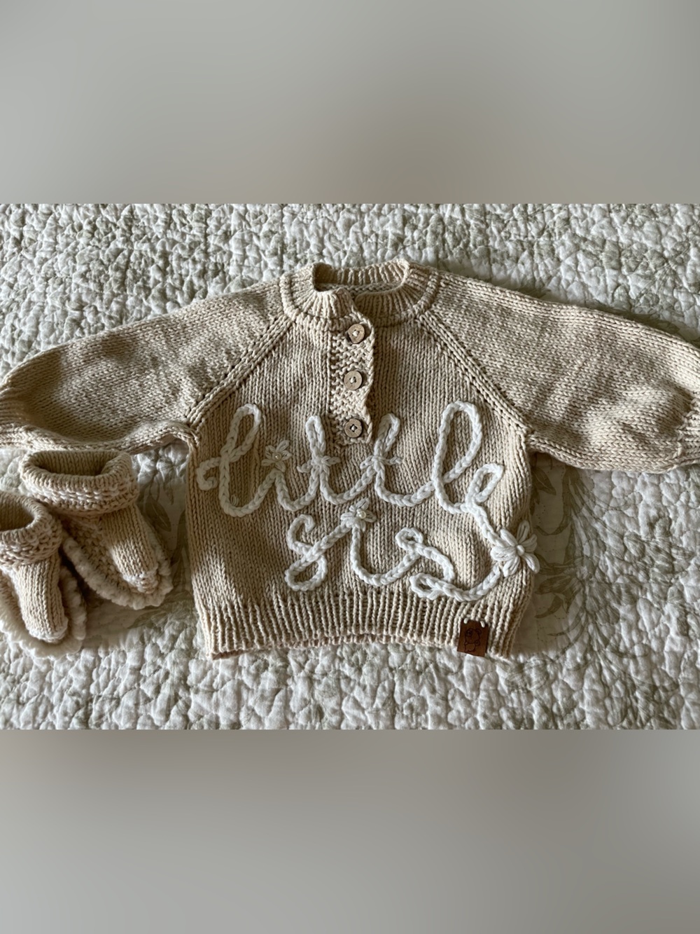 Hand-Knit Baby Sweater with Little Sis detail